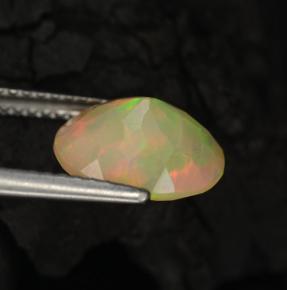 1.57克拉天然多色欧泊，椭圆形切割，10.1×8.2毫米，半透明