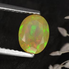 0.70克拉天然多色欧泊，椭圆形切割，7.8×5.9毫米，半透明