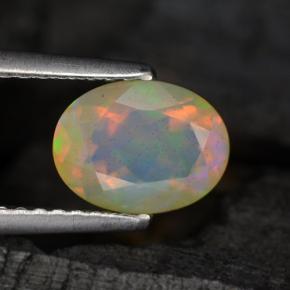 0.88克拉天然多色欧泊，椭圆形切割，8.1×6.1毫米，半透明