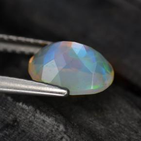 0.88克拉天然多色欧泊，椭圆形切割，8.1×6.1毫米，半透明