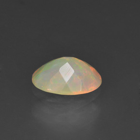 0.63克拉天然多色欧泊，椭圆形切割，7.9×6毫米，半透明