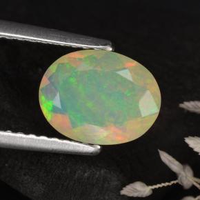 0.82克拉天然黄色欧泊，椭圆形切割，8.9×6.9毫米，半透明
