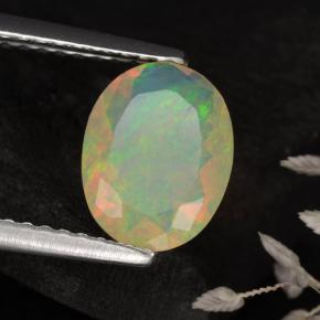 0.82克拉天然黄色欧泊，椭圆形切割，8.9×6.9毫米，半透明
