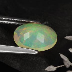0.82克拉天然黄色欧泊，椭圆形切割，8.9×6.9毫米，半透明