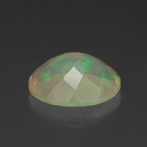 1.37克拉天然多色欧泊，椭圆形切割，10×8.1毫米，透明