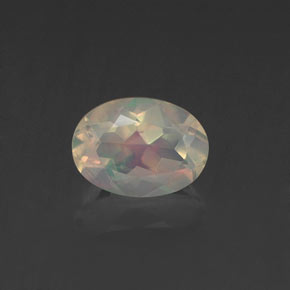 0.62克拉天然多色欧泊，椭圆形切割，6.9×5.1毫米，透明