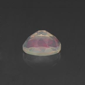 0.62克拉天然多色欧泊，椭圆形切割，6.9×5.1毫米，透明