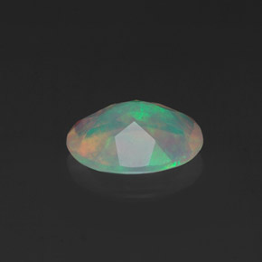 0.98克拉天然多色欧泊，椭圆形切割，9.1×7.1毫米，透明