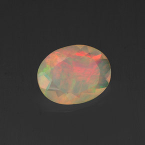 0.84克拉天然多色欧泊，椭圆形切割，9.1×7毫米，透明