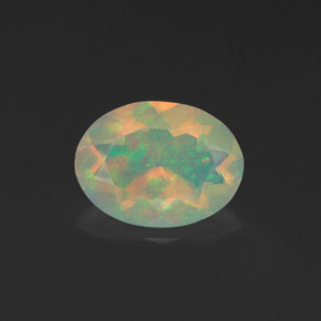 0.91克拉天然多色欧泊，椭圆形切割，9.1×6.8毫米，透明