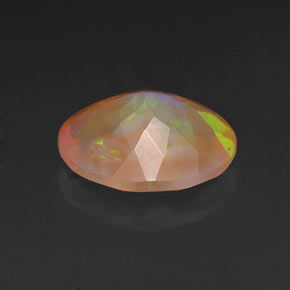 1.40克拉天然多色欧泊，椭圆形切割，10×8.1毫米，透明