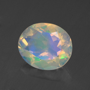 1.28克拉天然多色欧泊，椭圆形切割，9.2×7.7毫米，透明