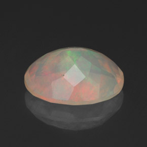1.54克拉天然多色欧泊，椭圆形切割，10×8.1毫米，透明