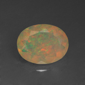 1.14克拉天然多色欧泊，椭圆形切割，9.2×7.1毫米，半透明