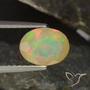 0.94克拉天然多色欧泊，椭圆形切割，8.2×6.2毫米，透明