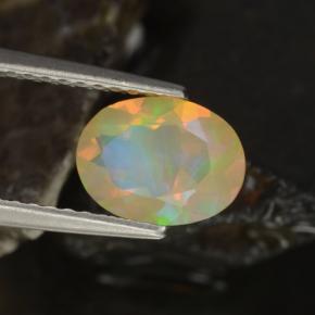 0.88克拉天然多色欧泊，椭圆形切割，8.3×6.2毫米，透明