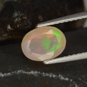 0.78克拉天然多色欧泊，椭圆形切割，8.2×6.2毫米，透明