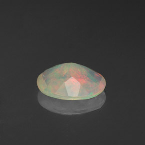 0.80克拉天然多色欧泊，透明，8.7×7.1毫米，透明/半透明