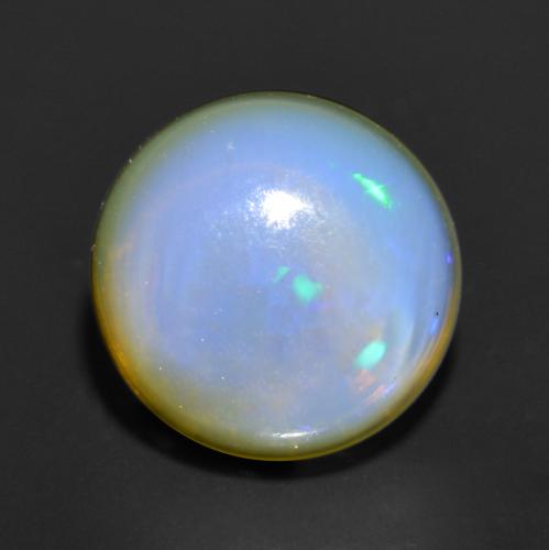 0.90克拉天然欧泊，圆形切割，半透明