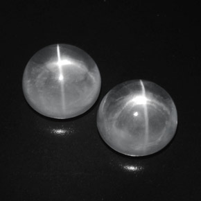 9.41天然白色Quartz Cat's Eye，圆形切割，10.29毫米，透明