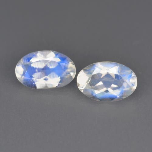 0.79天然白色彩虹月光石，椭圆形切割，6.1×3.9毫米，透明