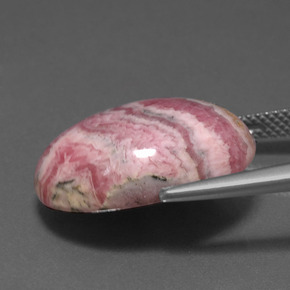 20.81克拉天然多色菱锰矿，椭圆形切割，20.3×15.2毫米，不透明
