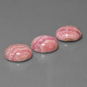 天然多色菱锰矿，椭圆形切割，12.2×10.1毫米，不透明