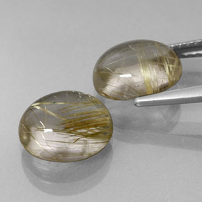 天然黄金色金红石石英，椭圆形切割，9.8×7.9毫米，透明