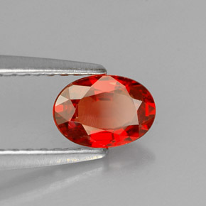 0.60克拉天然橙色蓝宝石，椭圆形切割，6.1×4.3毫米，VS