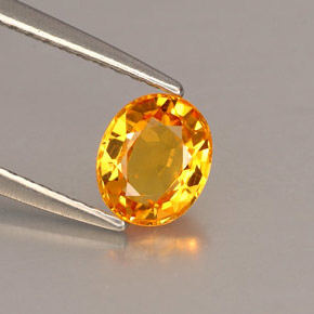 0.87克拉天然橙色蓝宝石，椭圆形切割，6.2×5.2毫米，VVS