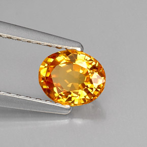0.69克拉天然橙色蓝宝石，椭圆形切割，5.8×4.7毫米，VVS