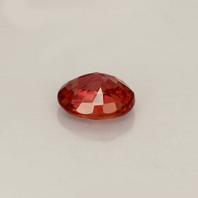 0.64克拉天然橙色蓝宝石，椭圆形切割，5.6×4.7毫米，VVS-VS