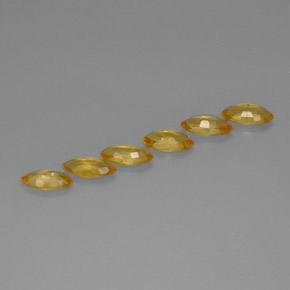 天然黄色蓝宝石，马眼形，6.2×3.1毫米，VVS-VS