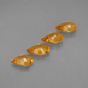 天然黄色蓝宝石，梨形，6.9×4.8毫米，VVS-VS