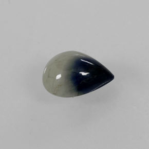0.90克拉天然双色蓝宝石，梨形，6.6×5.2毫米，半透明
