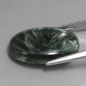 12.14克拉天然蛇纹石，椭圆形切割，不透明