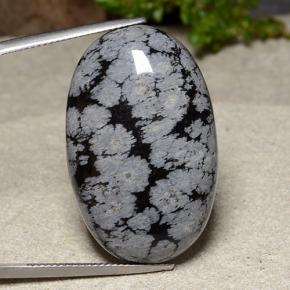 39.18克拉天然多色雪花黑曜石，椭圆形切割，32.7×20.9毫米，不透明