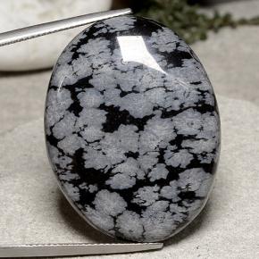 43.07克拉天然多色雪花黑曜石，椭圆形切割，33.8×26毫米，不透明