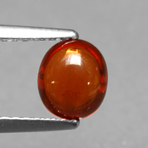 1.22克拉天然橙色锰铝榴石，椭圆形切割，6.6×5.7毫米，半透明