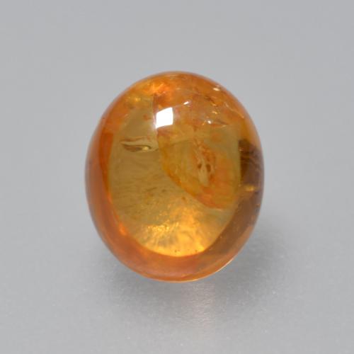 0.91克拉天然橙色锰铝榴石，椭圆形切割，5.9×5.1毫米，透明