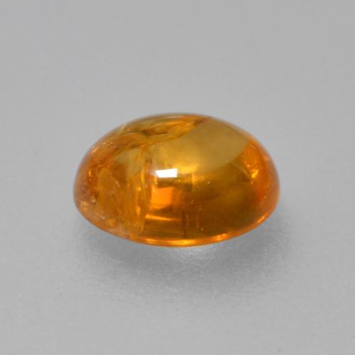 0.91克拉天然橙色锰铝榴石，椭圆形切割，5.9×5.1毫米，透明