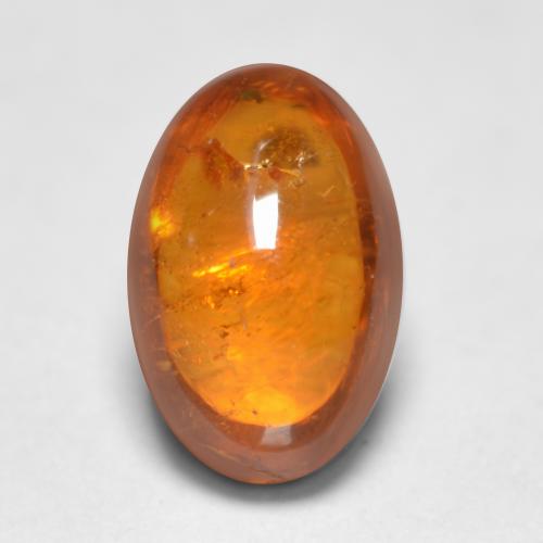 0.81克拉天然橙色锰铝榴石，椭圆形切割，6.3×4.2毫米，透明