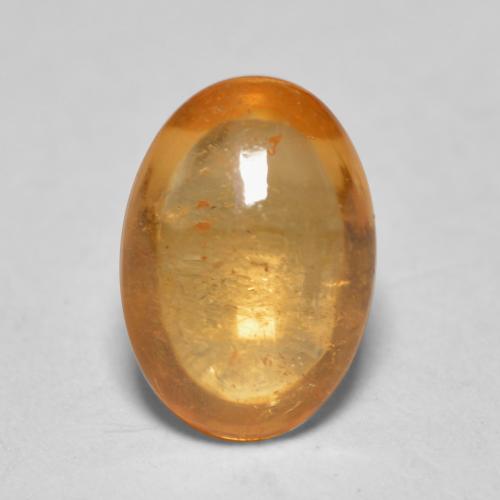 0.82克拉天然橙色锰铝榴石，椭圆形切割，6.5×4.6毫米，透明