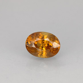 0.99克拉天然橙色榍石，椭圆形切割，6.6×4.9毫米，VS
