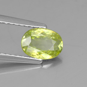 0.81克拉天然绿色榍石，椭圆形切割，7×5.1毫米，VS