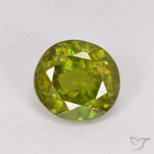 0.95ct 天然 温暖的森林绿 榍石, 椭圆形, VS-SI