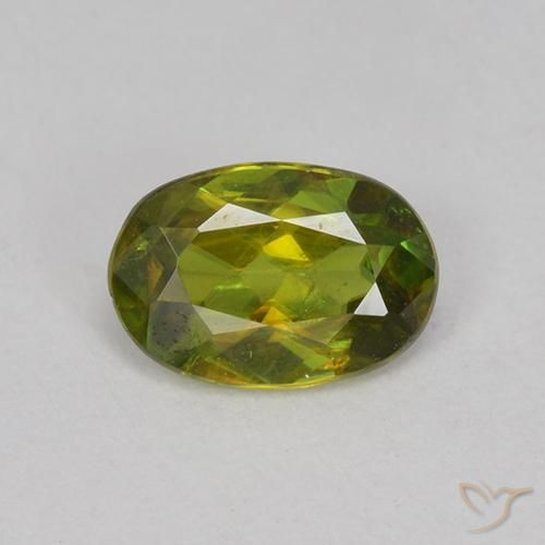 0.60ct 天然 暖土绿 榍石, 椭圆形, VVS-VS