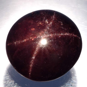 21.50克拉天然黑色星光石榴石，椭圆形切割，14.3×13.5毫米，不透明