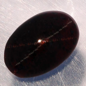 3.87克拉天然黑色星光石榴石，椭圆形切割，10.6×7.2毫米，半透明