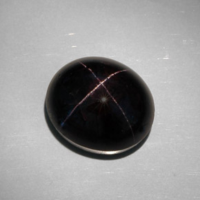 35.68克拉天然黑色星光石榴石，椭圆形切割，17.6×15.3毫米，不透明